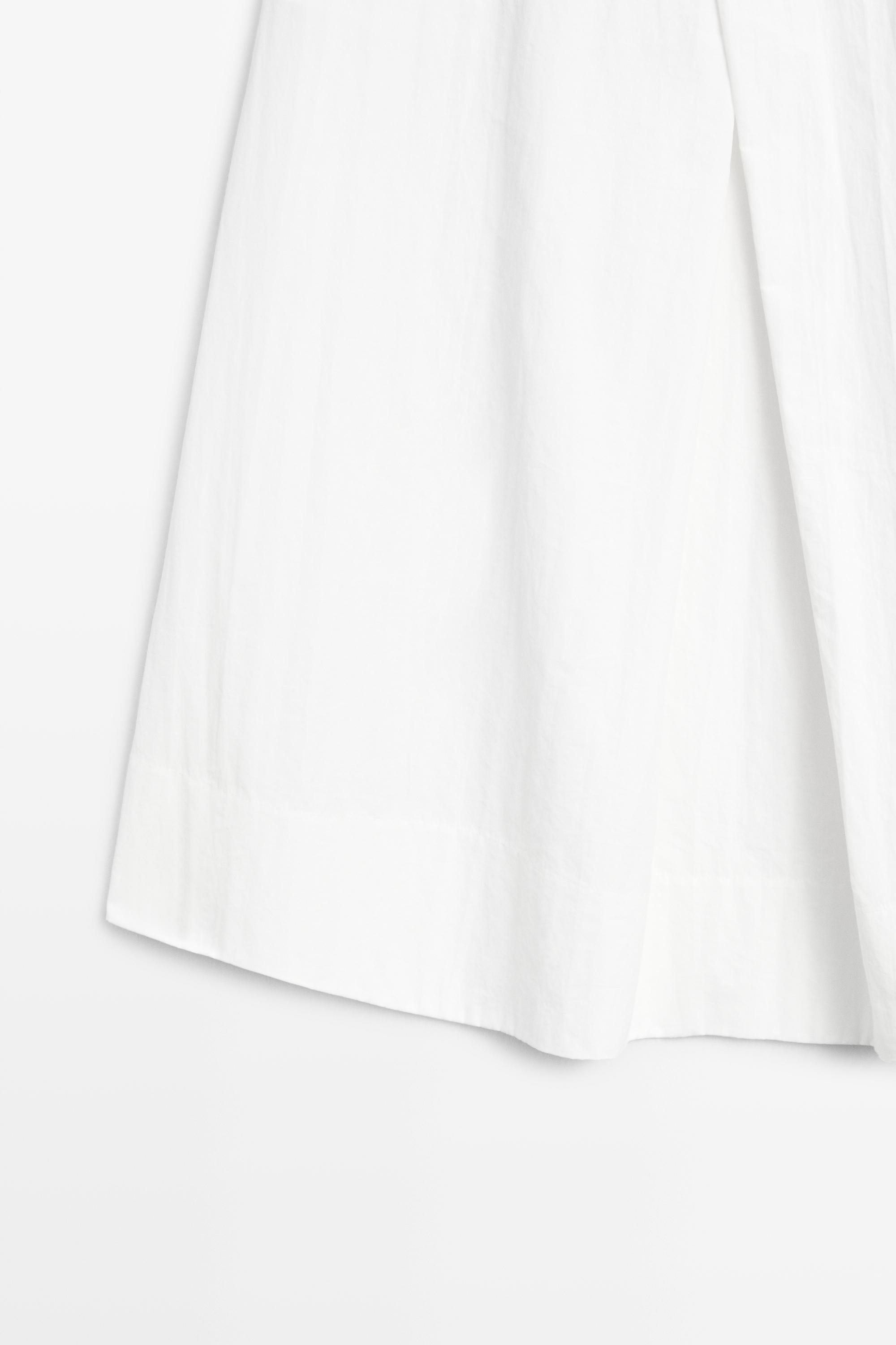 Midi skirt with yoke and pleated detail